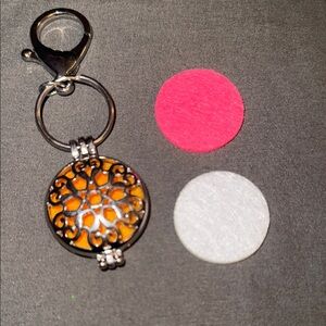 Orange and Silver Keychain with Interchangeable Pads